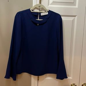 Stunning Amanda UPrichard cutout neckline blouse